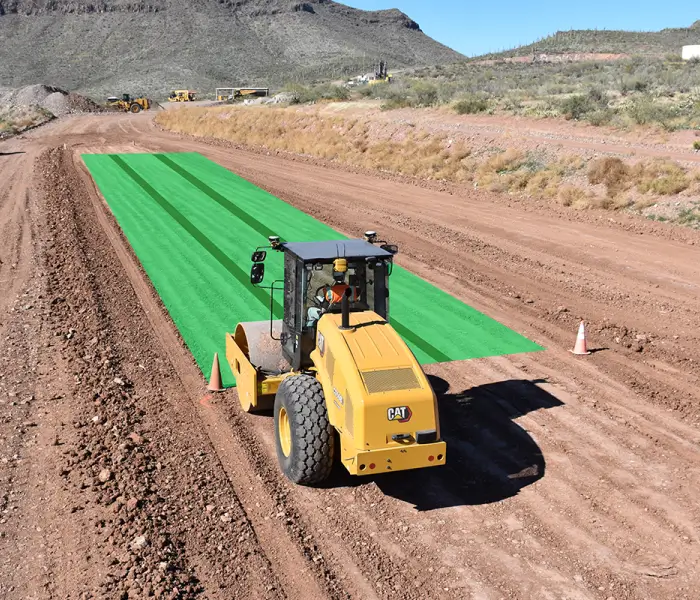 CAT road compactor on construction site
